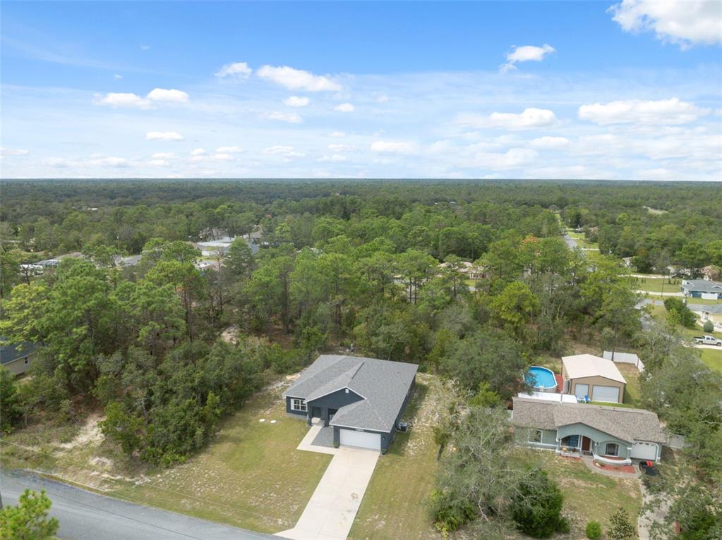 13073 Jaywalk Road Weeki Wachee, FL 34614 - Photo 23 of 44 an aerial view of a house