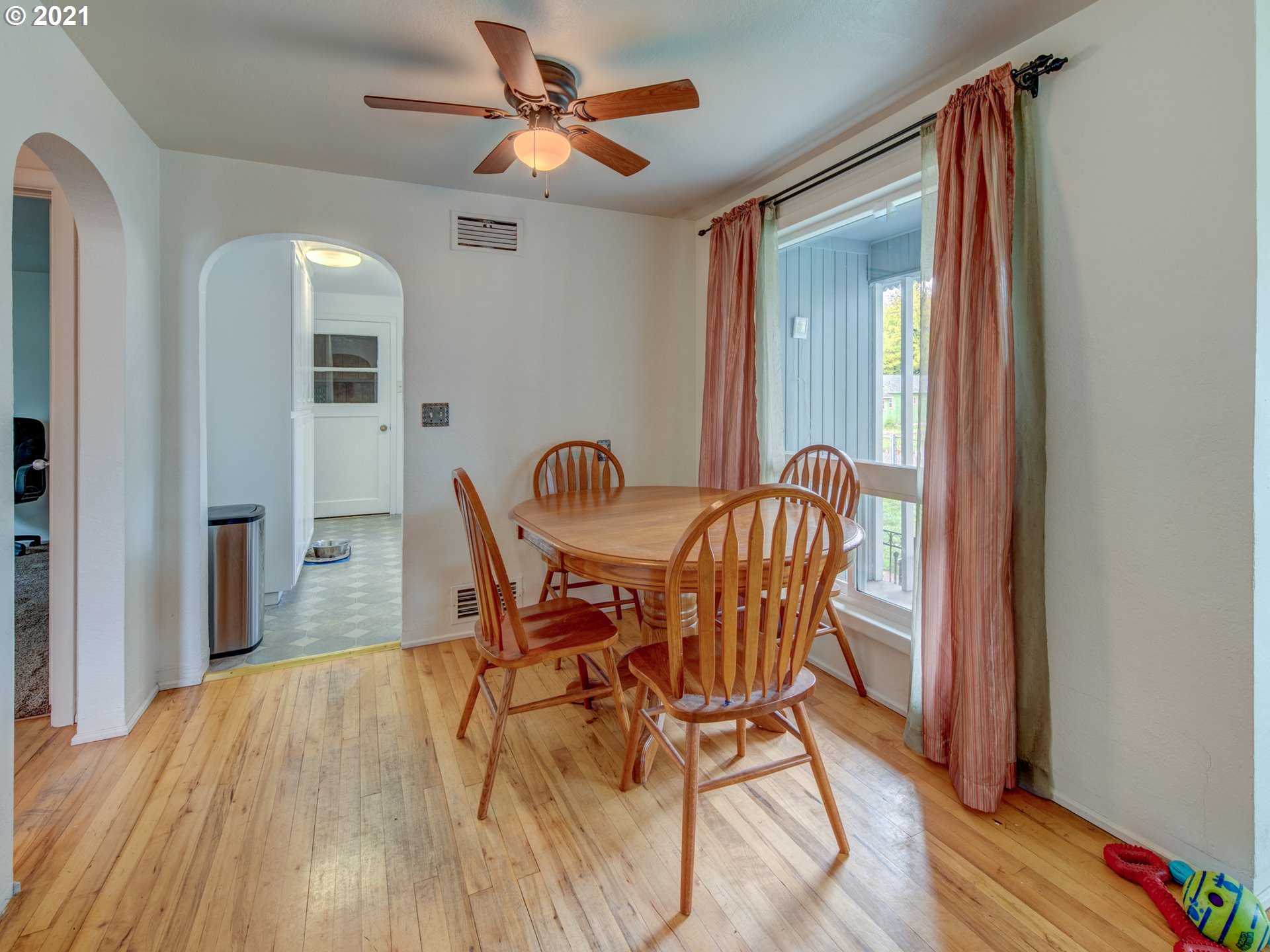 1393 8th Street Springfield, OR 97477 - Photo 12 of 23 a view of a dining room with furniture and wooden floor