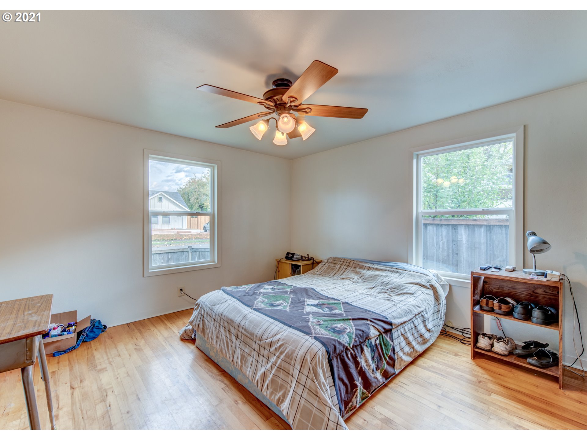 1393 8th Street Springfield, OR 97477 - Photo 14 of 23 a bedroom with a bed and a window