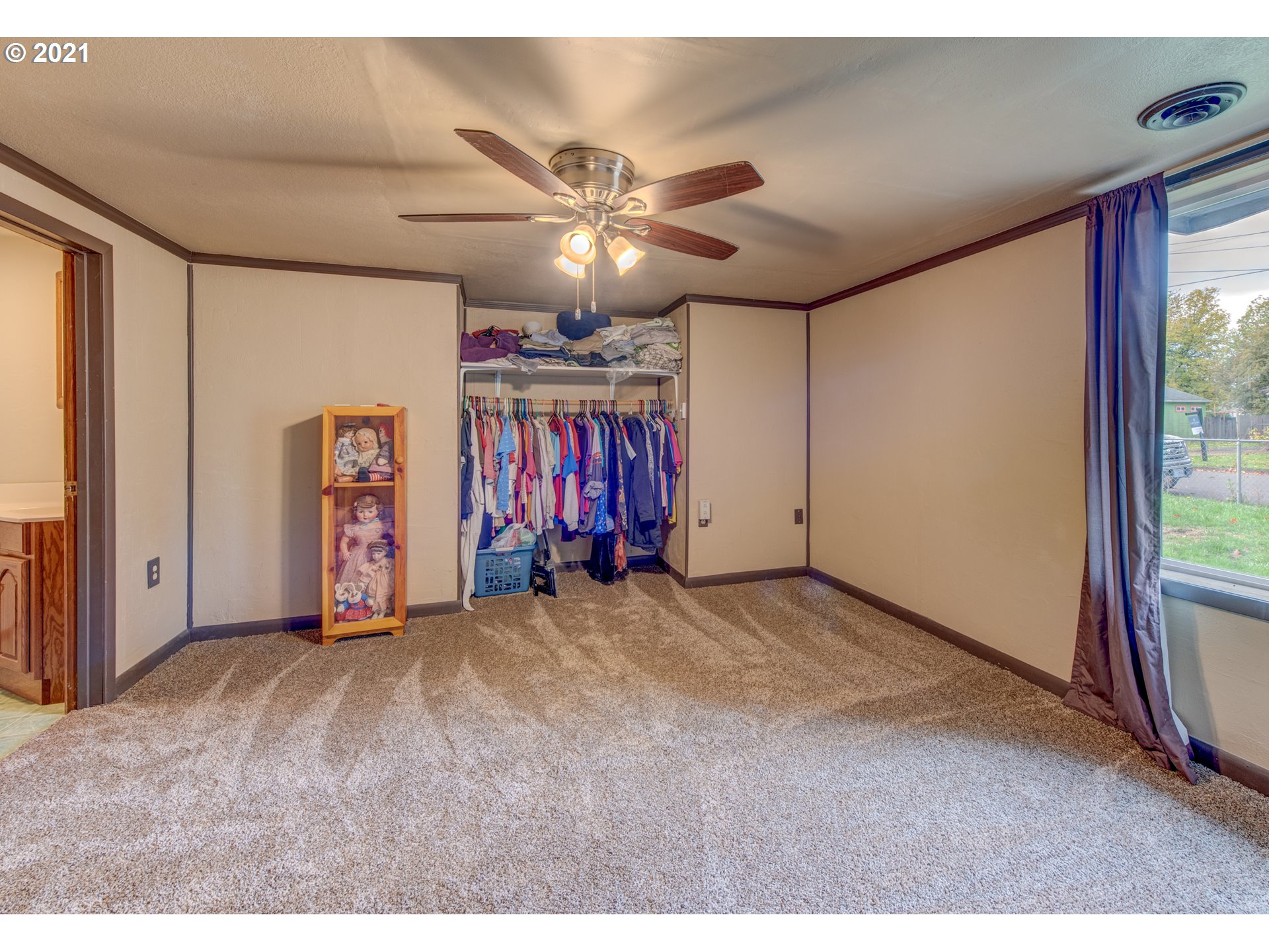 1393 8th Street Springfield, OR 97477 - Photo 15 of 23 a view of a livingroom with furniture and chandelier fan