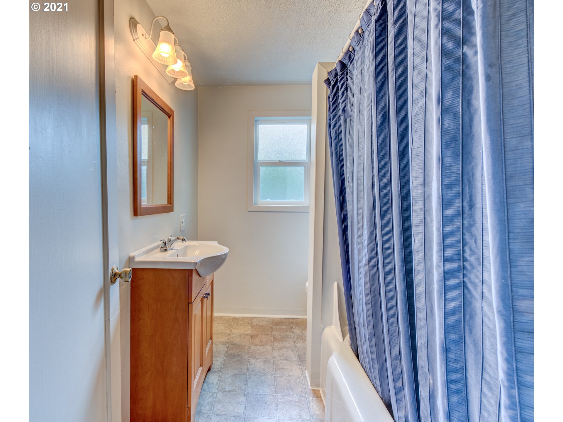 1393 8th Street Springfield, OR 97477 - Photo 16 of 23 a view of an entryway with wooden floor
