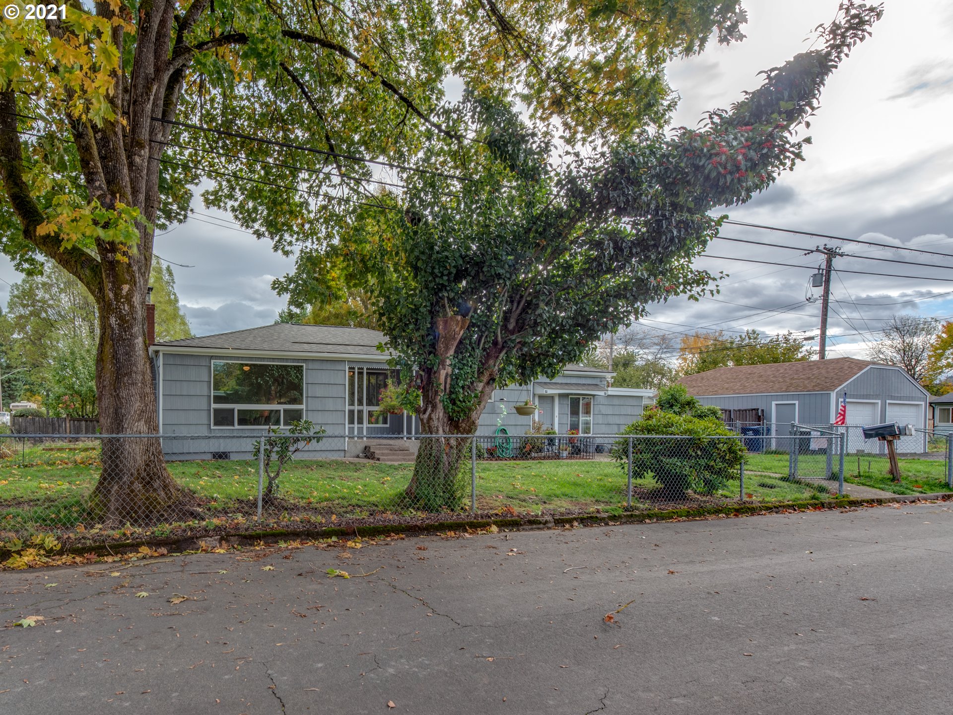 1393 8th Street Springfield, OR 97477 - Photo 22 of 23 a front view of house with yard and green space