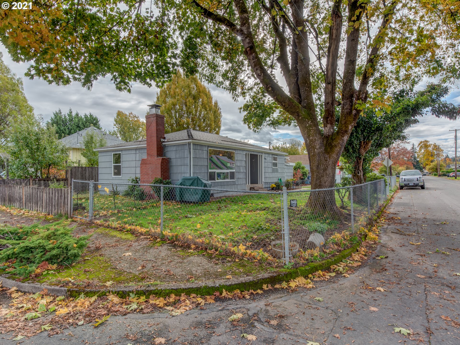 1393 8th Street Springfield, OR 97477 - Photo 23 of 23 a view of a house with a yard