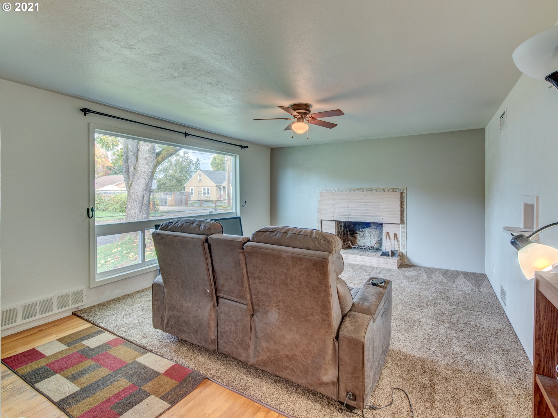 1393 8th Street Springfield, OR 97477 - Photo 7 of 23 a living room with furniture and a large window