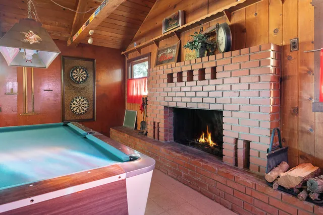 a kitchen with a sink and a large window