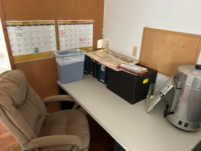 a view of a house with a snow in the yard