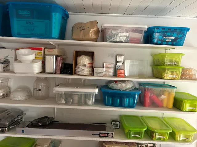 a view of a door and chair in the patio