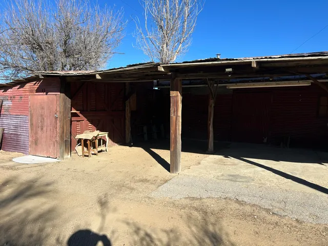 a view of a yard with an outdoor space