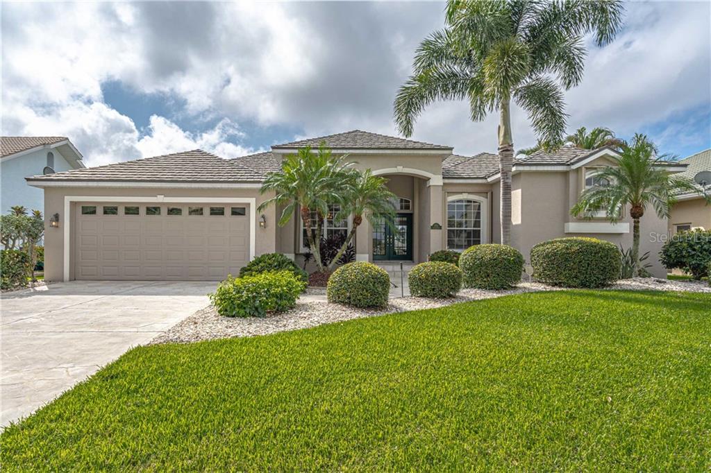 QUICK ACCESS! CUSTOM 3/2.5/2 WATERFRONT POOL HOME WITH SAILBOAT ACCESS IN MERE MINUTES TO CHARLOTTE HARBOR LEADING TO THE GULF OF MEXICO VIA PONCE INLET!