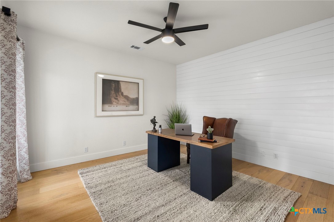1130 Stoney Ridge Road Bulverde, TX 78163 - Photo 17 of 42 a view of a workspace with furniture