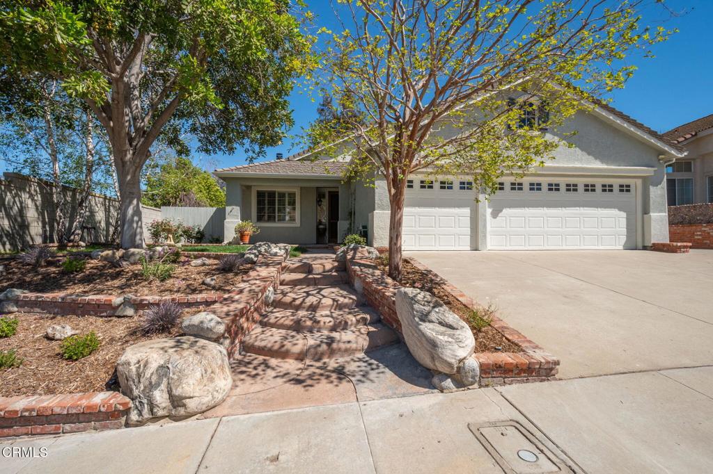 1898 Summertime Avenue Simi Valley, CA 93065 - Photo 1 of 1 a view of a house with a tree in front