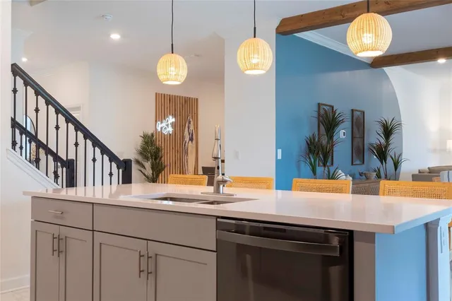 a bedroom with a bed and painting on the wall