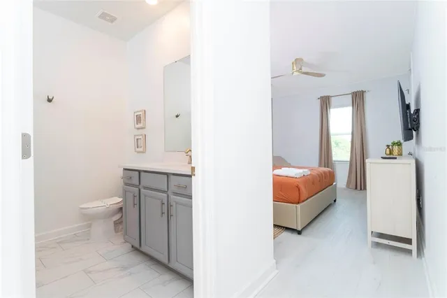 a view of an chairs and table in the balcony