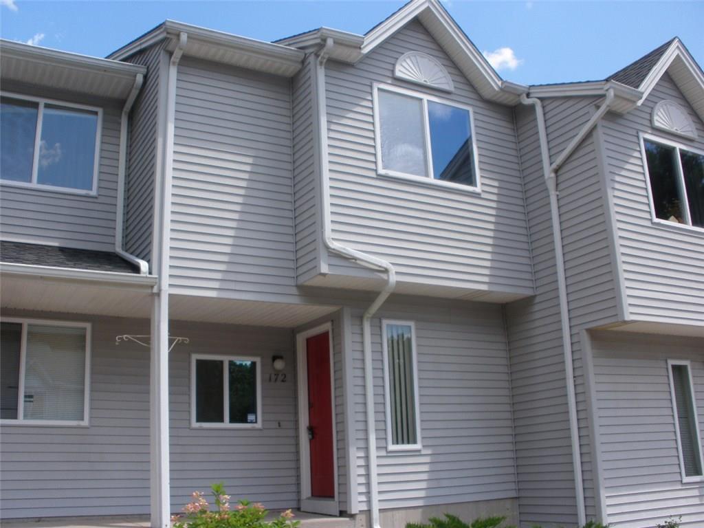 155 Redstone Hill Road, Unit 172 Bristol, CT 06010 - Photo 1 of 1 a front view of a house with a balcony