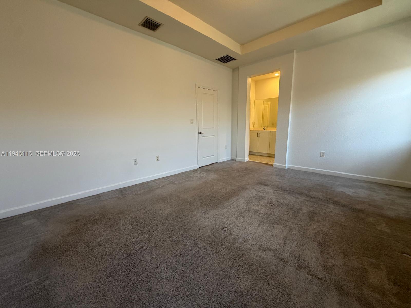 3326 West 112th Street Hialeah, FL 33018 - Photo 18 of 37 an empty room with a window