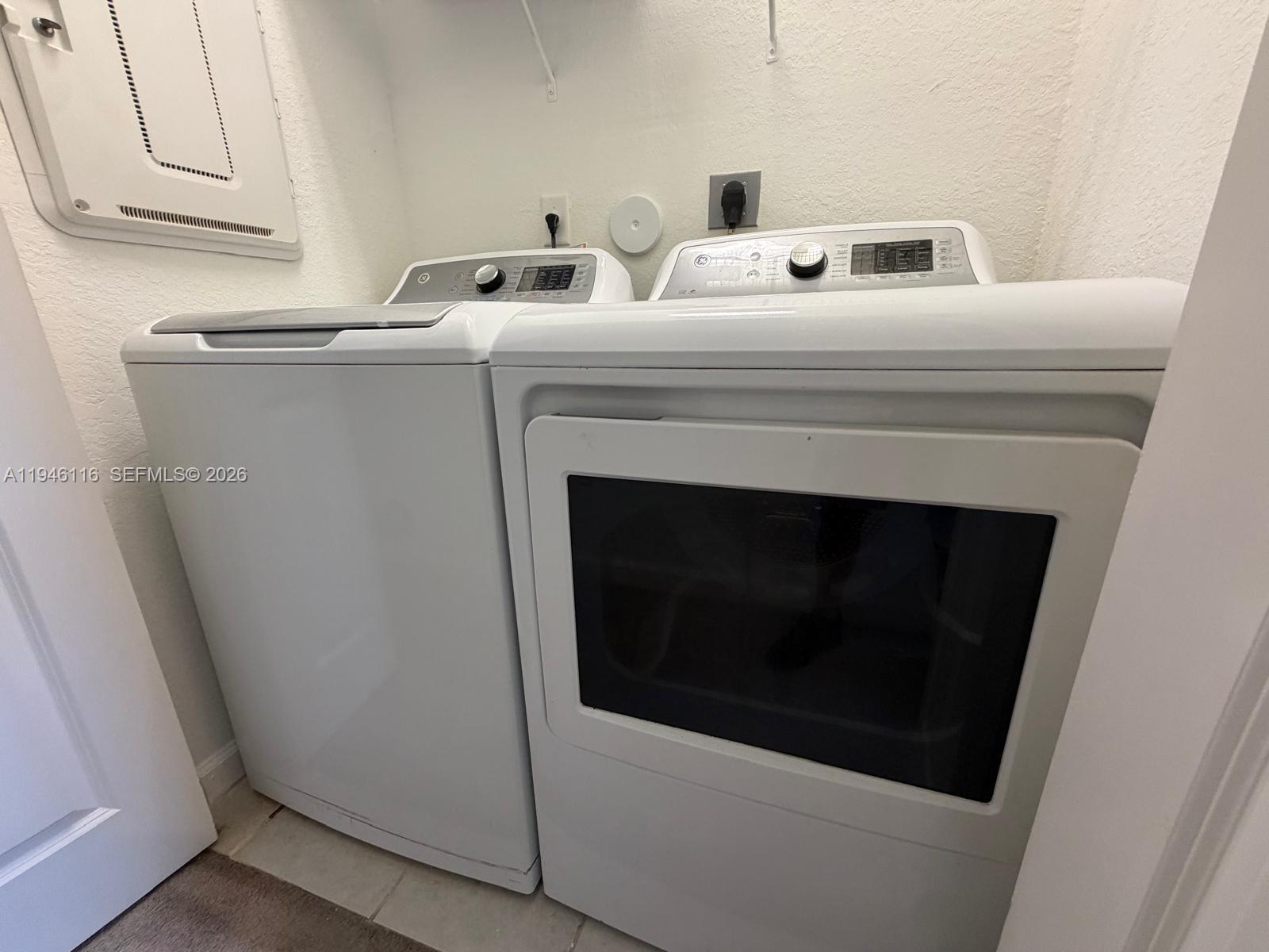 3326 West 112th Street Hialeah, FL 33018 - Photo 28 of 37 a utility room with dryer and washer
