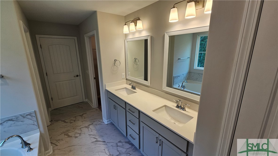 67 Shoefstall Street Savannah, GA 31407 - Photo 12 of 30 2 Sink Quartz Vanity in Primary Bathroom