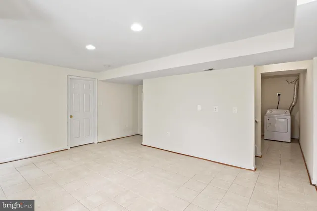 a view of a room with a hallway