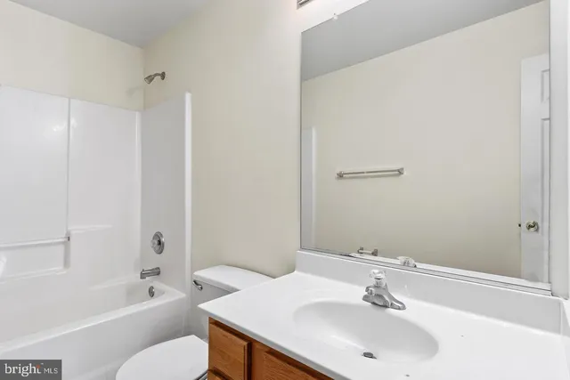 a bathroom with a sink toilet and a bathtub