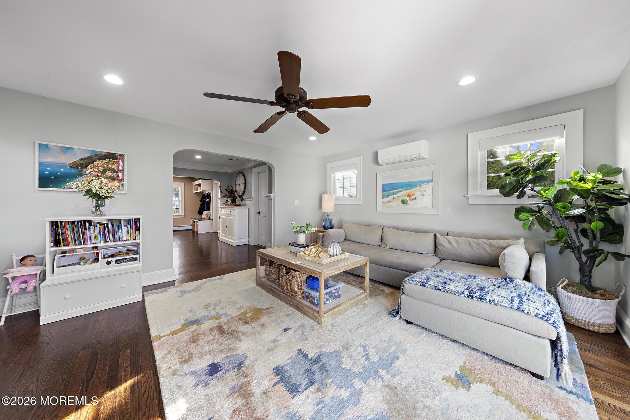 49 Jackson Street Fair Haven, NJ 07704 - Photo 14 of 42 a living room with furniture and a flat screen tv