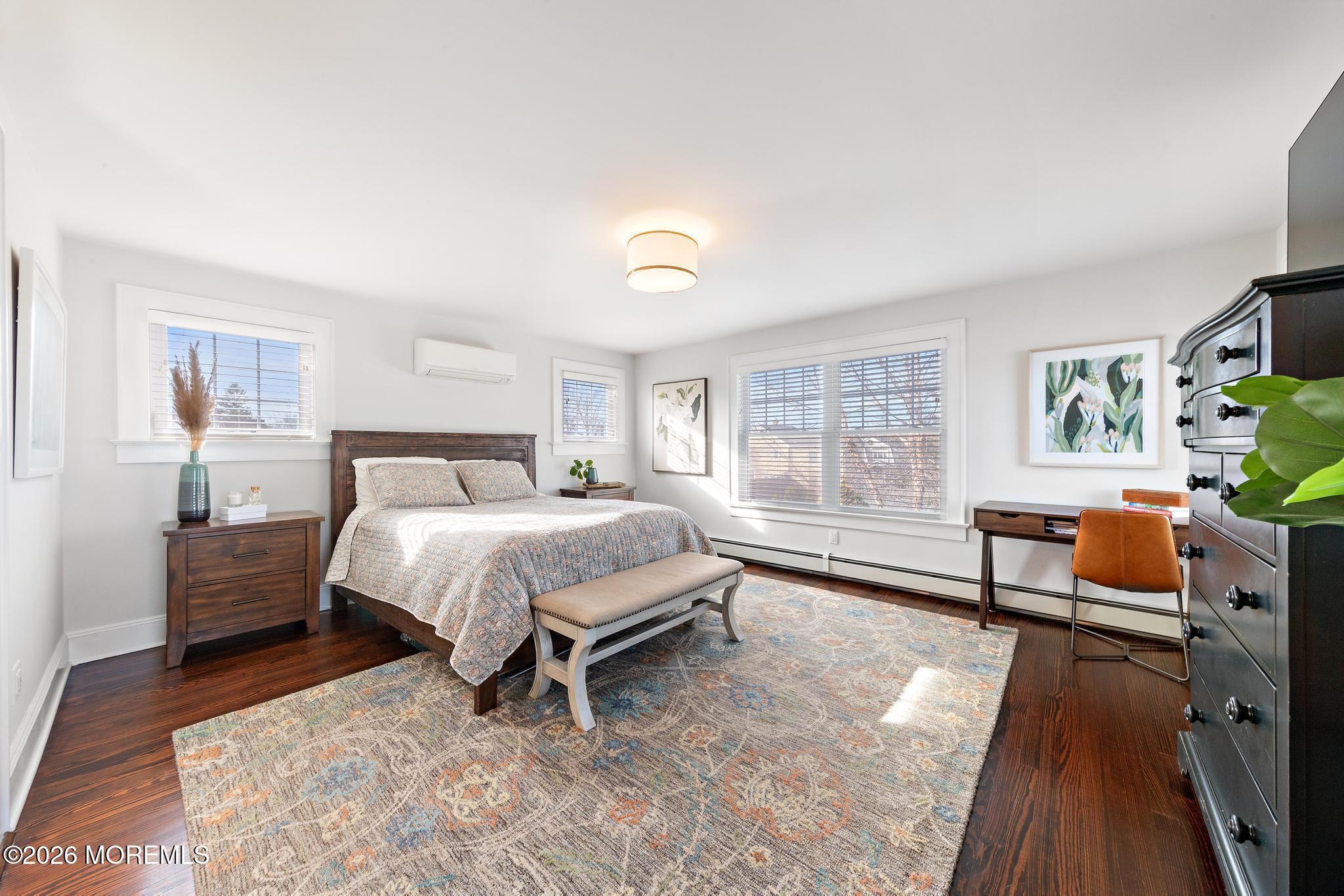 49 Jackson Street Fair Haven, NJ 07704 - Photo 20 of 42 a spacious bedroom with a bed and a couch