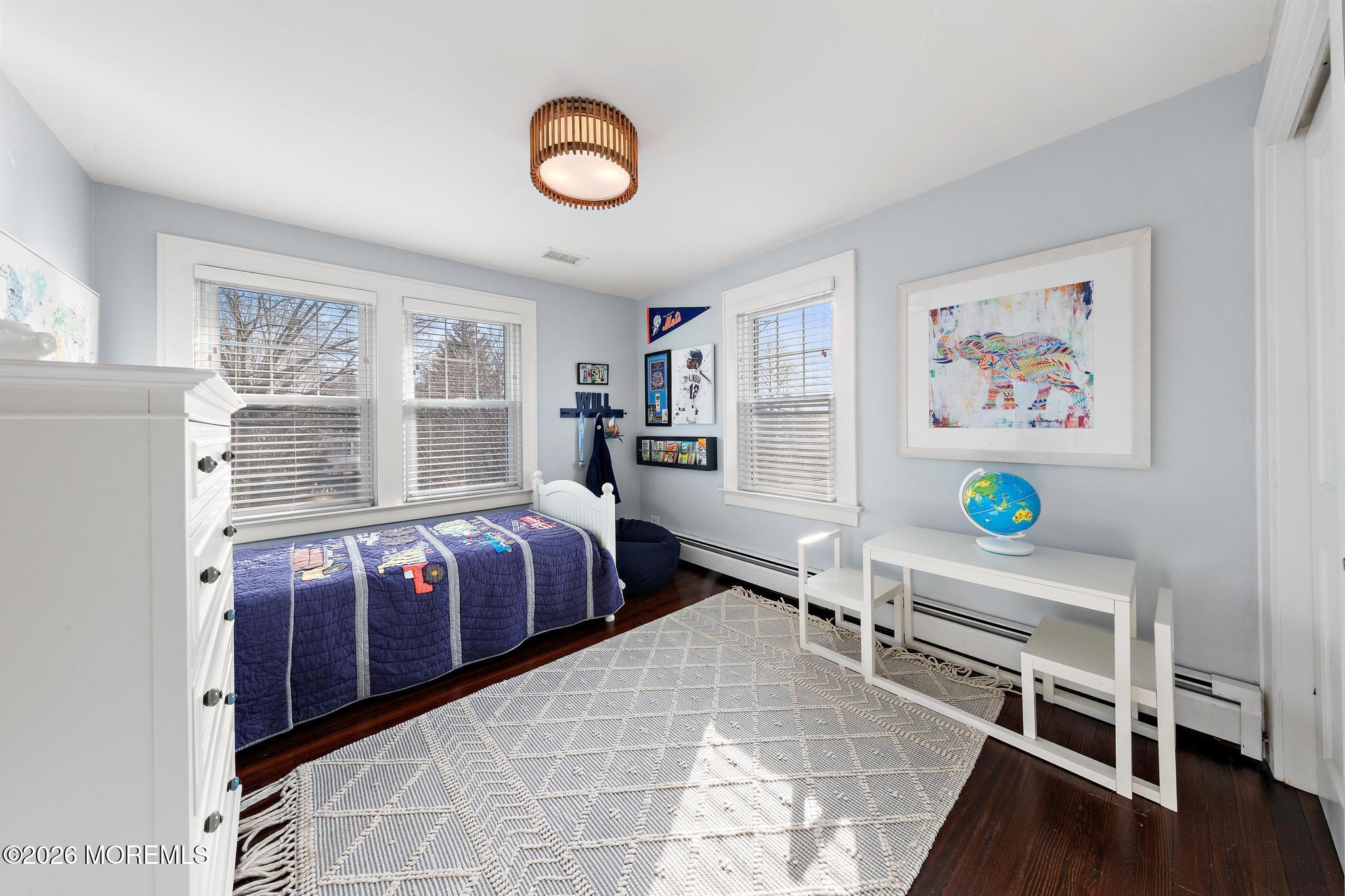 49 Jackson Street Fair Haven, NJ 07704 - Photo 24 of 42 a bedroom with a bed and a window
