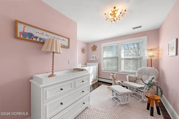 a room with a bed and furniture