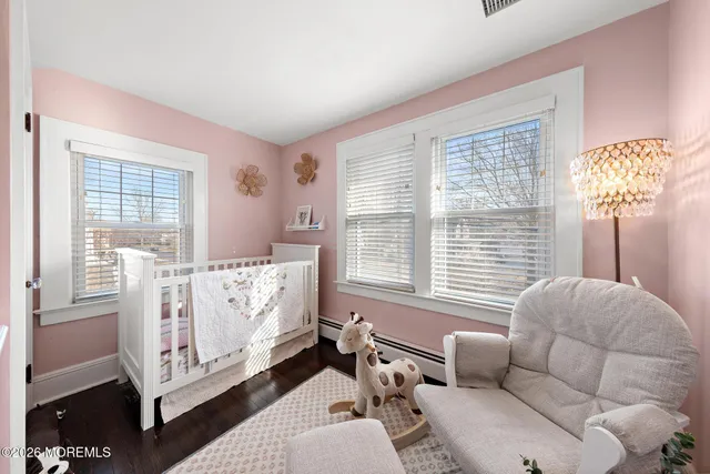 a bed room with furniture and a window