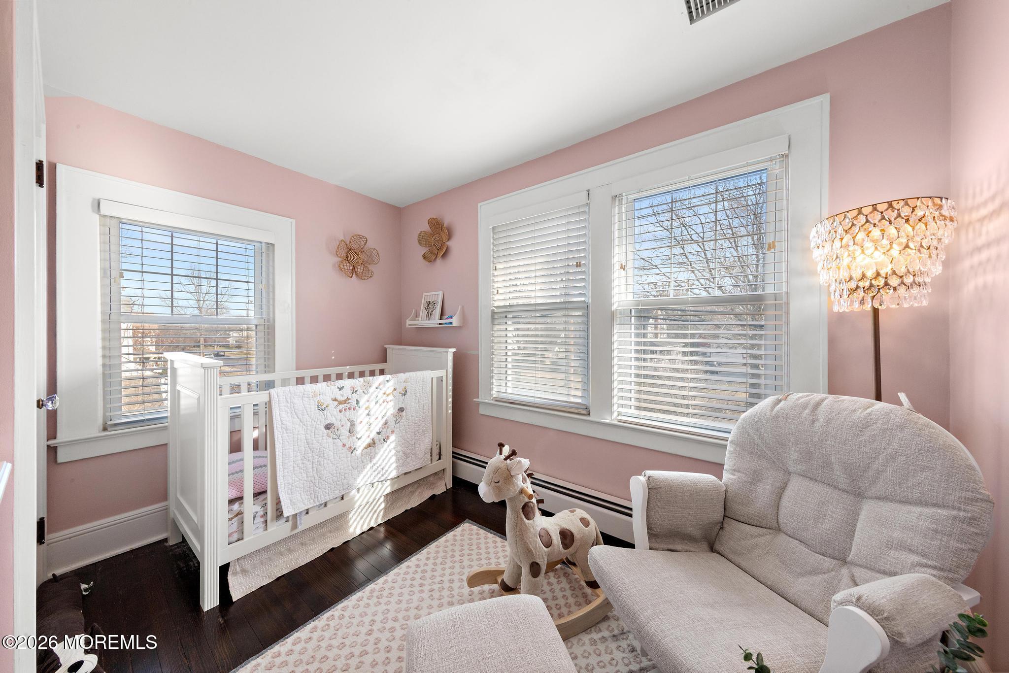 49 Jackson Street Fair Haven, NJ 07704 - Photo 27 of 42 a bed room with furniture and a window