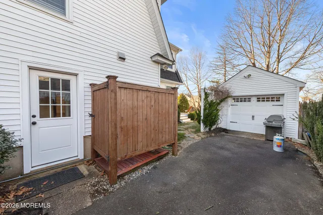 a view of a house with a street