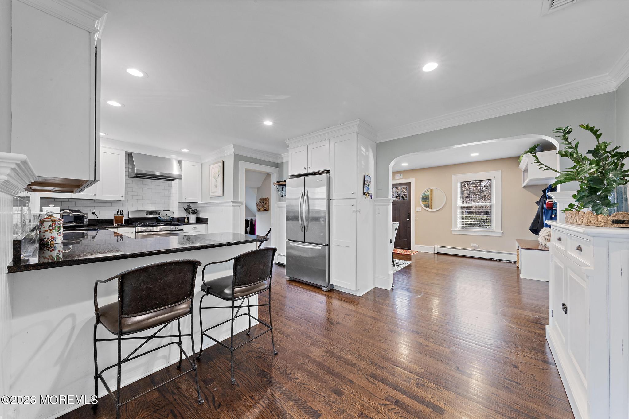 49 Jackson Street Fair Haven, NJ 07704 - Photo 7 of 42 a kitchen with stainless steel appliances granite countertop a refrigerator and a stove top oven