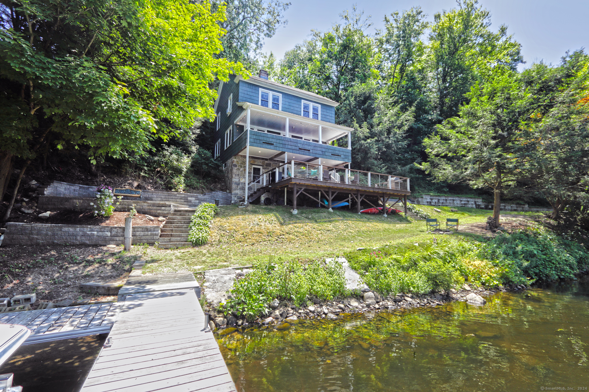 9 Bridge Road Monroe, CT 06468 - Photo 1 of 1 Serene evenings by the lake begin at home...
