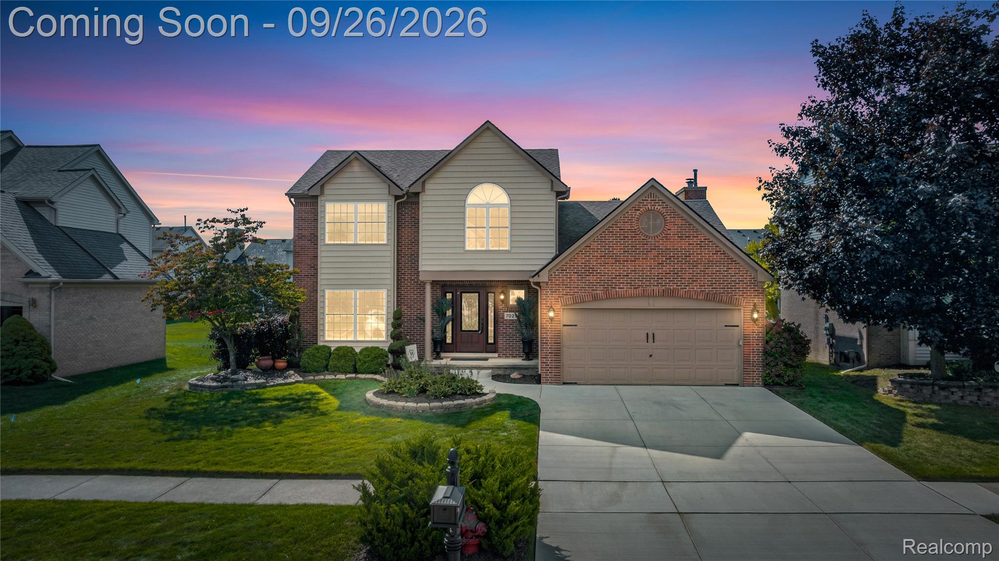 7021 Fox Path Canton, MI 48187 - Photo 1 of 59 Brick and siding exterior with an attached two-car garage, concrete driveway, and established front yard landscaping