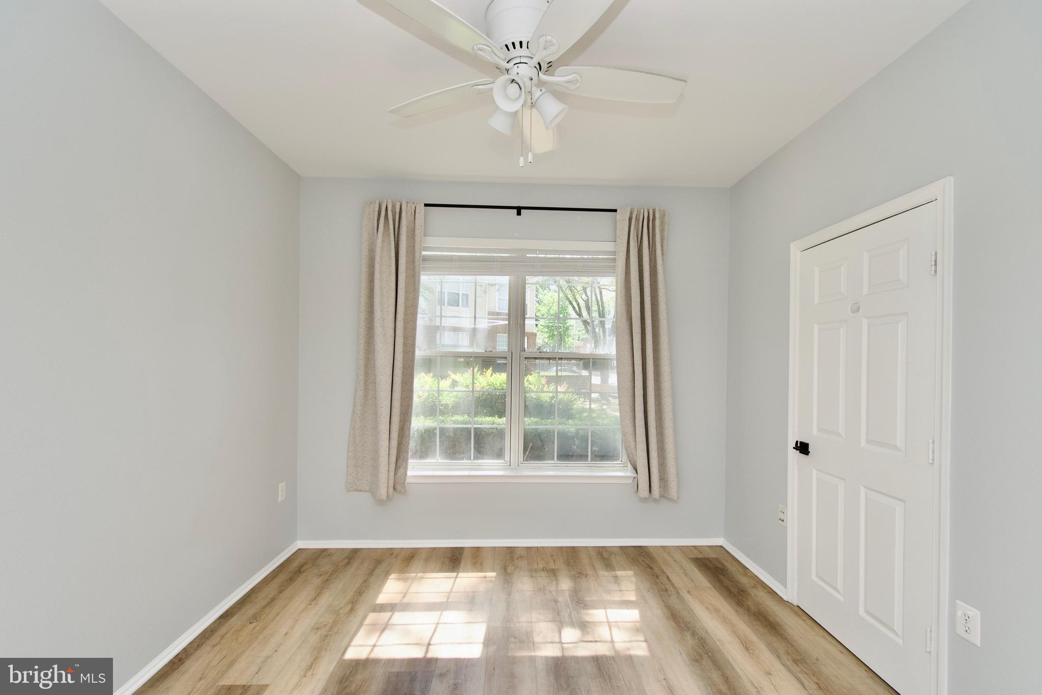 3003 Nicosh Circle, Unit 3106 Falls Church, VA 22042 - Photo 16 of 25 a view of an empty room with a window