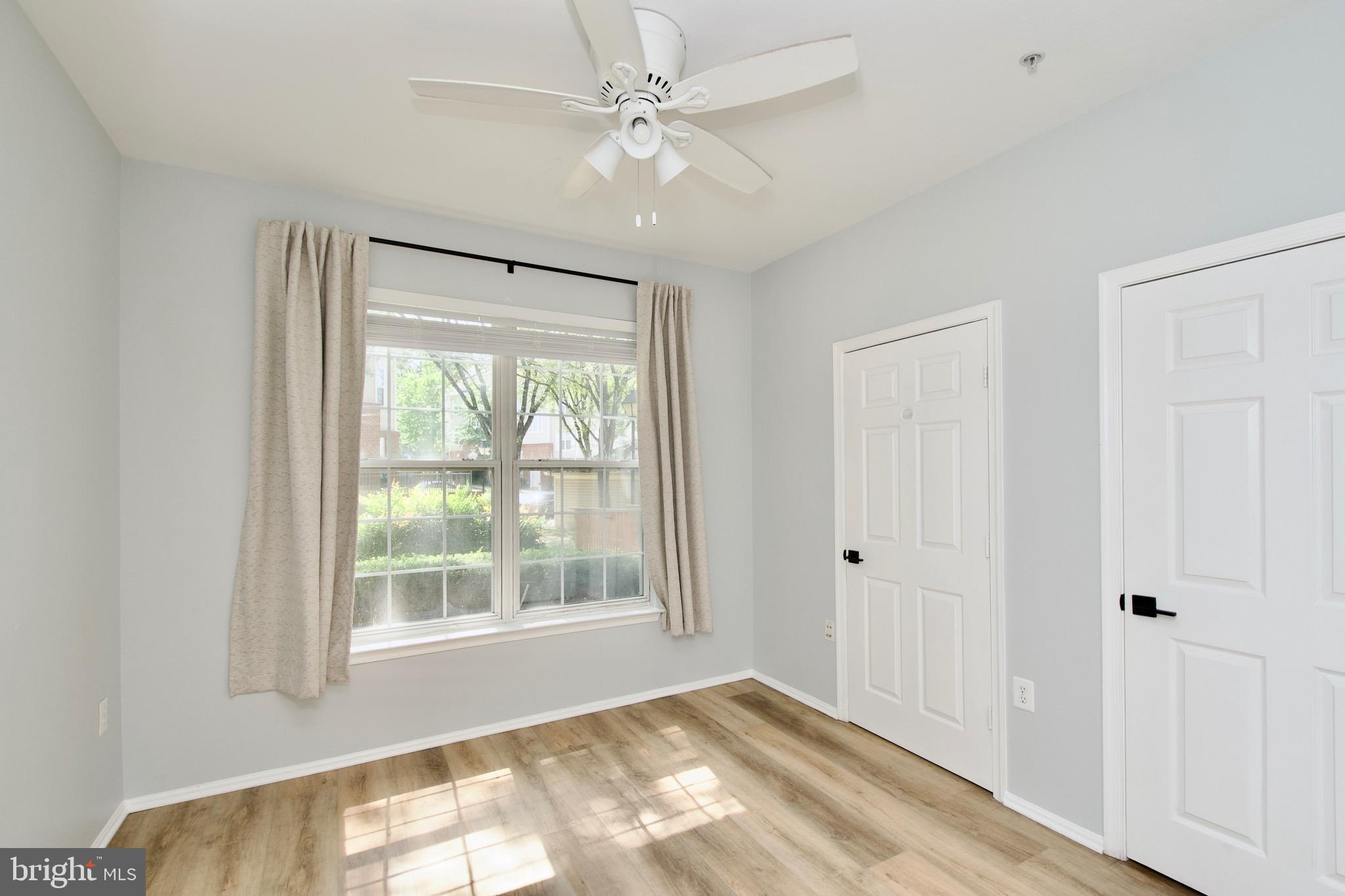 3003 Nicosh Circle, Unit 3106 Falls Church, VA 22042 - Photo 17 of 25 a view of an empty room with a window