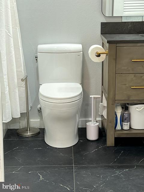 3003 Nicosh Circle, Unit 3106 Falls Church, VA 22042 - Photo 22 of 25 a bathroom with a toilet and a sink