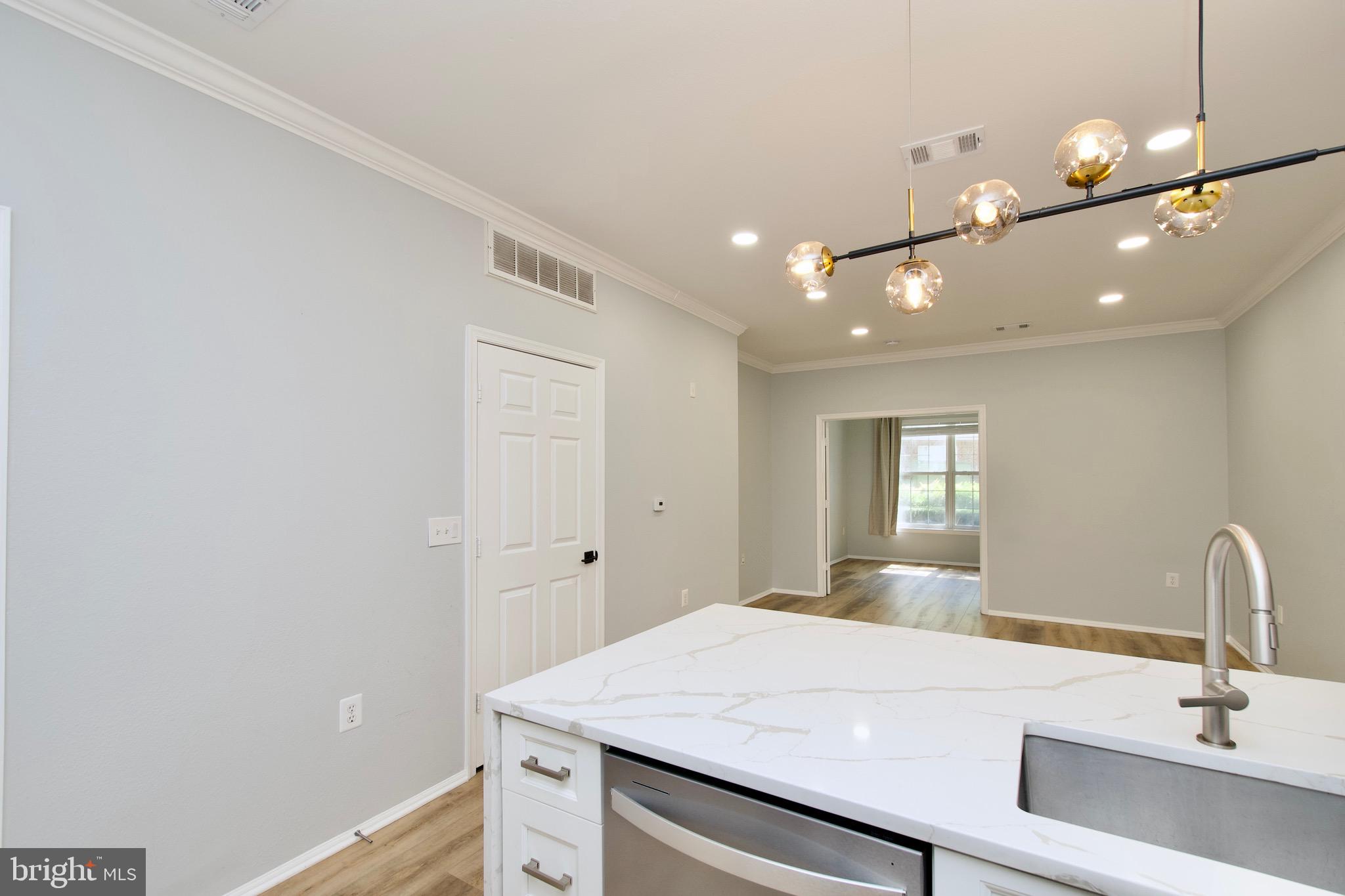 3003 Nicosh Circle, Unit 3106 Falls Church, VA 22042 - Photo 9 of 25 a bathroom with a sink a vanity and a mirror