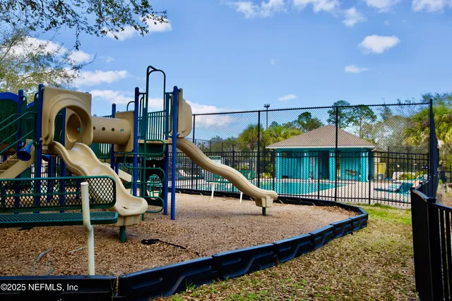 a view of a house with a park