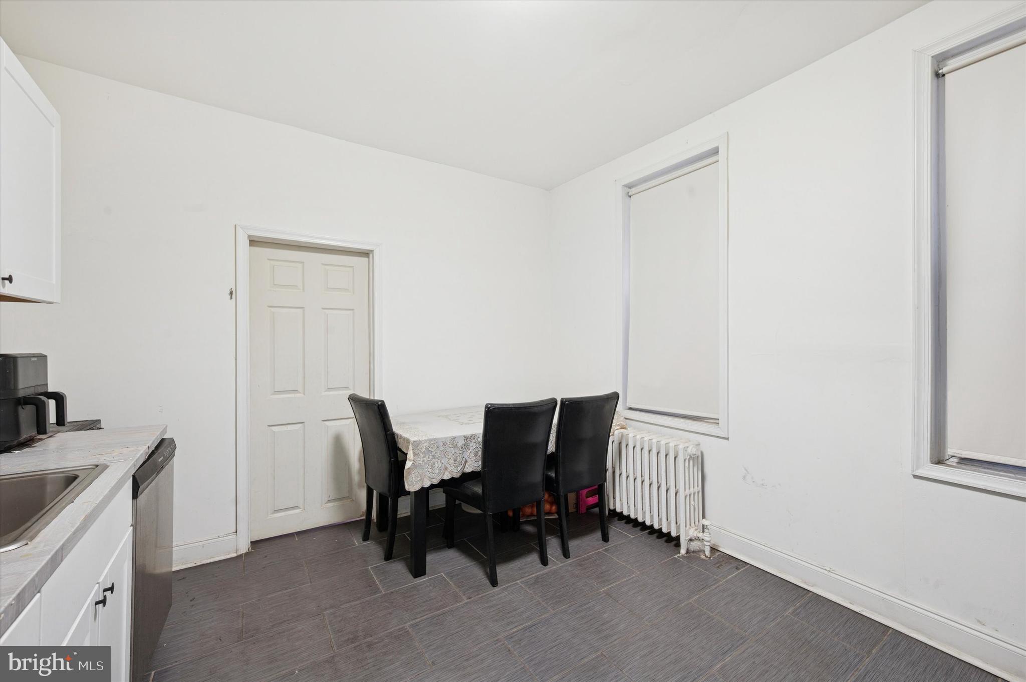 6105 Locust Street Philadelphia, PA 19139 - Photo 5 of 15 a view of workspace with furniture and cabinet