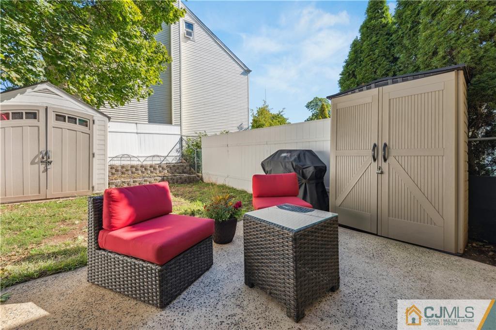 11 Kyle Street Manville, NJ 08835 - Photo 16 of 16 a view of a chairs in back yard of the house