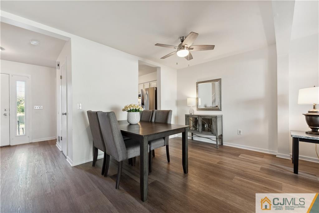 11 Kyle Street Manville, NJ 08835 - Photo 6 of 16 a view of a dining room with furniture and wooden floor