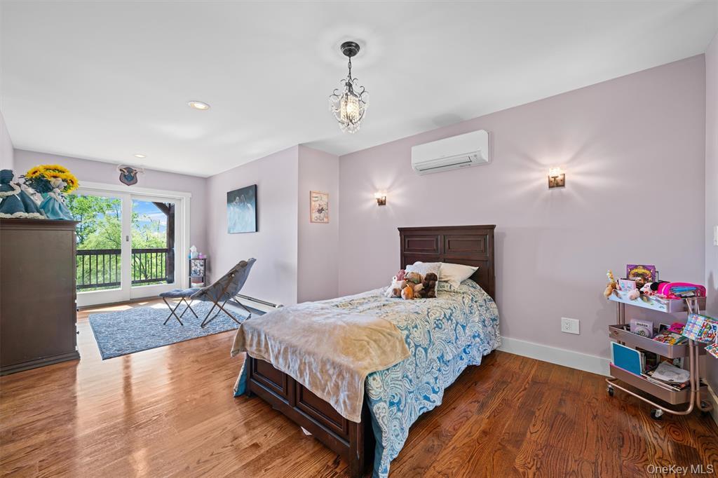 535 County Rte 22 Parish, NY 13131 - Photo 25 of 35 a bedroom with a bed and a window