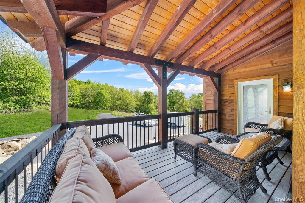 535 County Rte 22 Parish, NY 13131 - Photo 34 of 35 a balcony with furniture and a garden