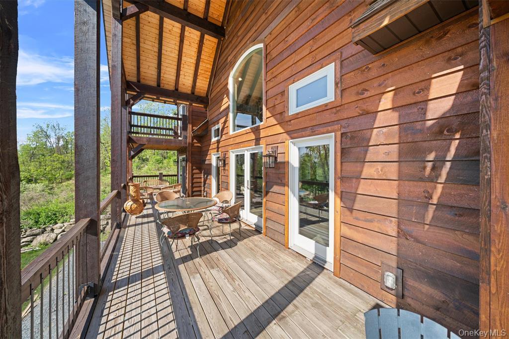 535 County Rte 22 Parish, NY 13131 - Photo 35 of 35 a view of balcony with wooden floor and outdoor seating