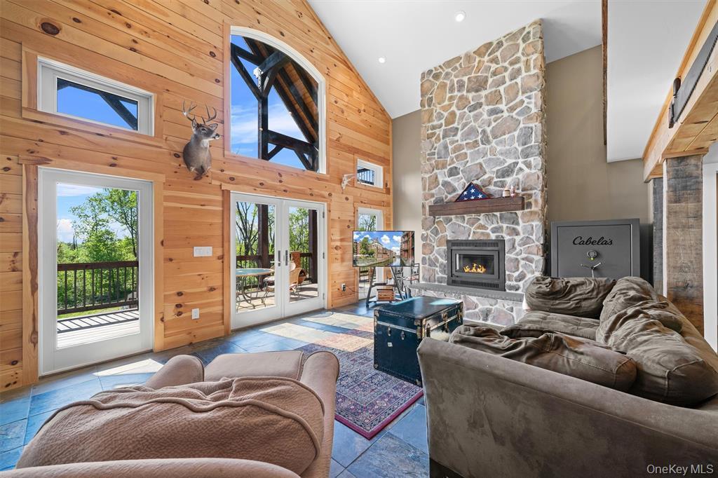 535 County Rte 22 Parish, NY 13131 - Photo 4 of 35 a living room with furniture large window and fireplace