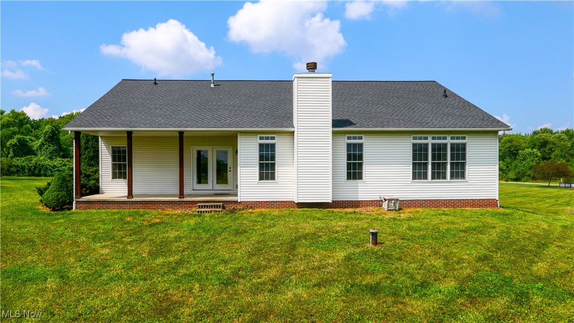 4840 Wayne Road Mantua, OH 44255 - Photo 38 of 42 Rear view of home with covered concrete porch perfect for morning coffee or evening relaxation