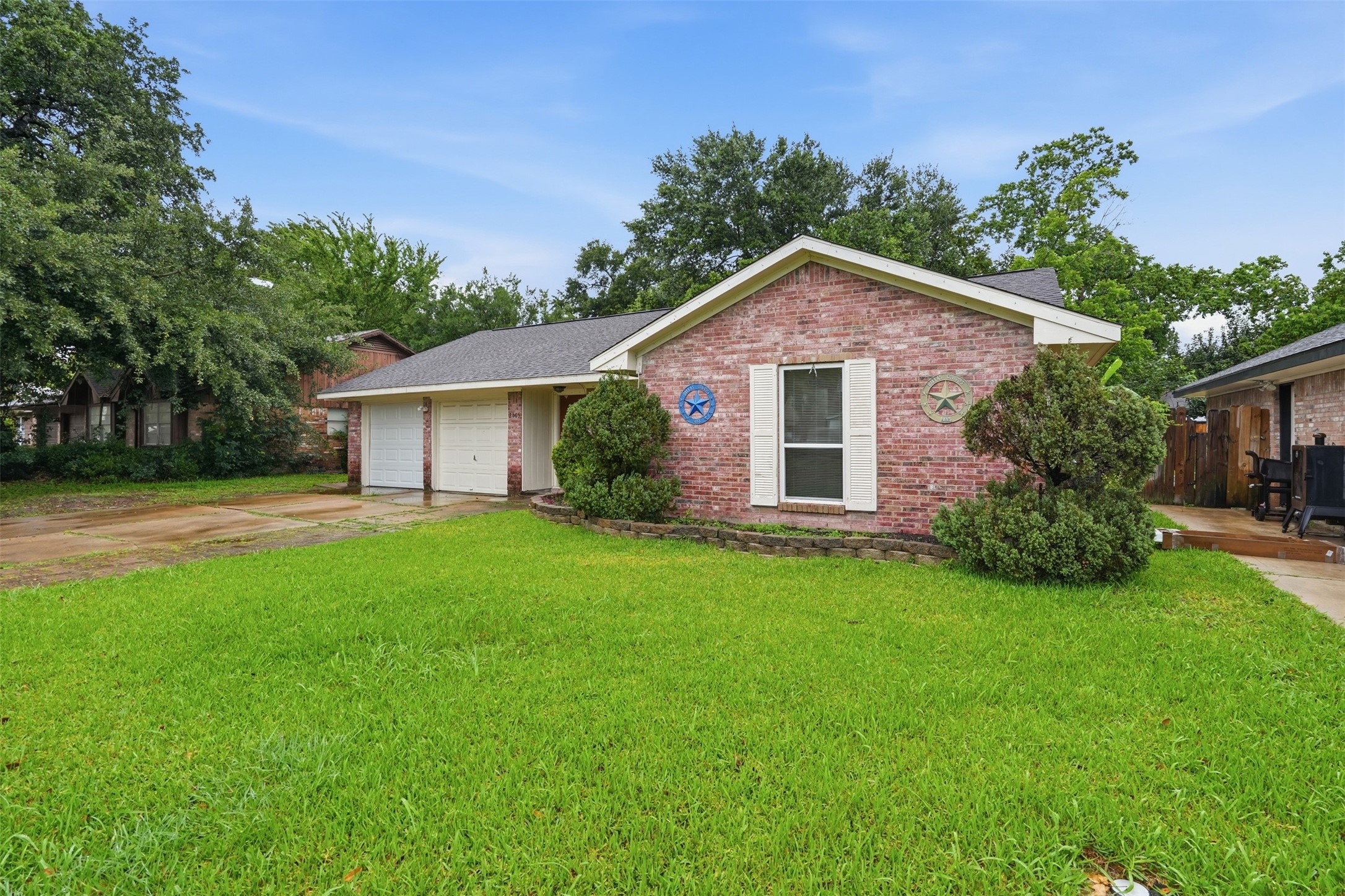 2605 Burke Road Pasadena, TX 77502 - Photo 2 of 29 a front view of house with yard and green space