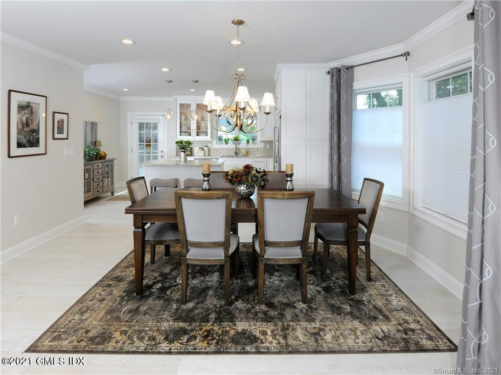 18 William Street, Unit WEST Greenwich, CT 06830 - Photo 3 of 21 a view of a dining room with furniture