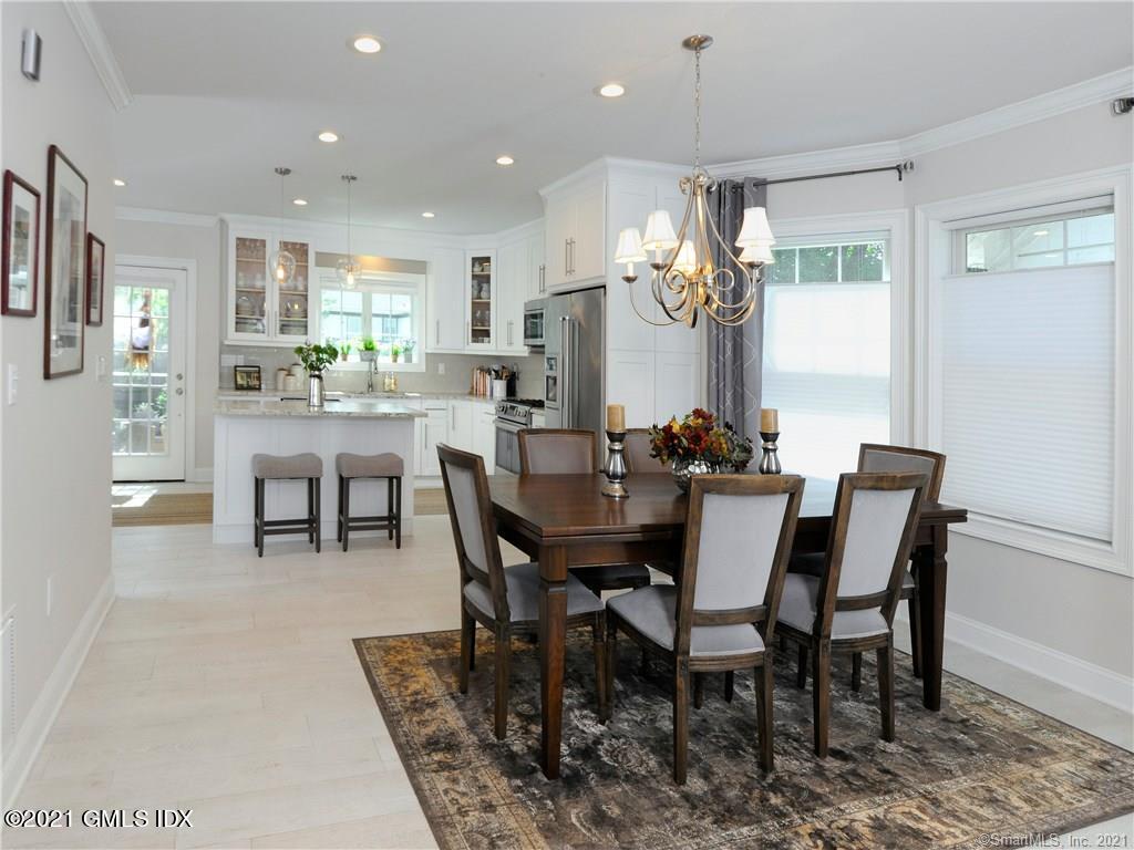 18 William Street, Unit WEST Greenwich, CT 06830 - Photo 5 of 21 a view of a dining room with furniture