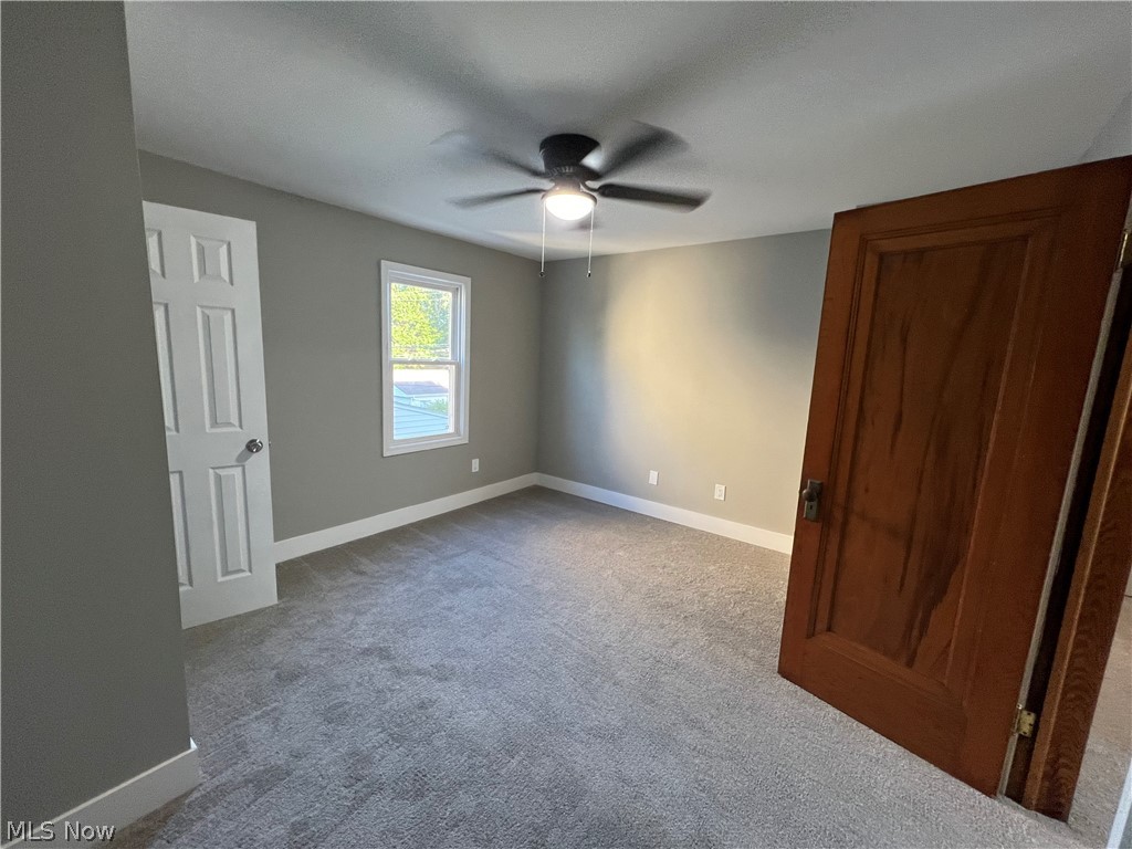 4523 Maplecrest Avenue Parma, OH 44134 - Photo 23 of 31 Carpeted empty room with ceiling fan